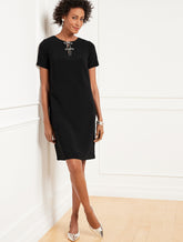 BLACK|RED POP EMBELLISHED BOW CREPE A-LINE DRESS | Talbots on sale